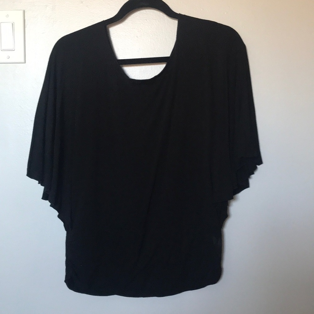 Scooped-neck, ruffle edged winged blouse
